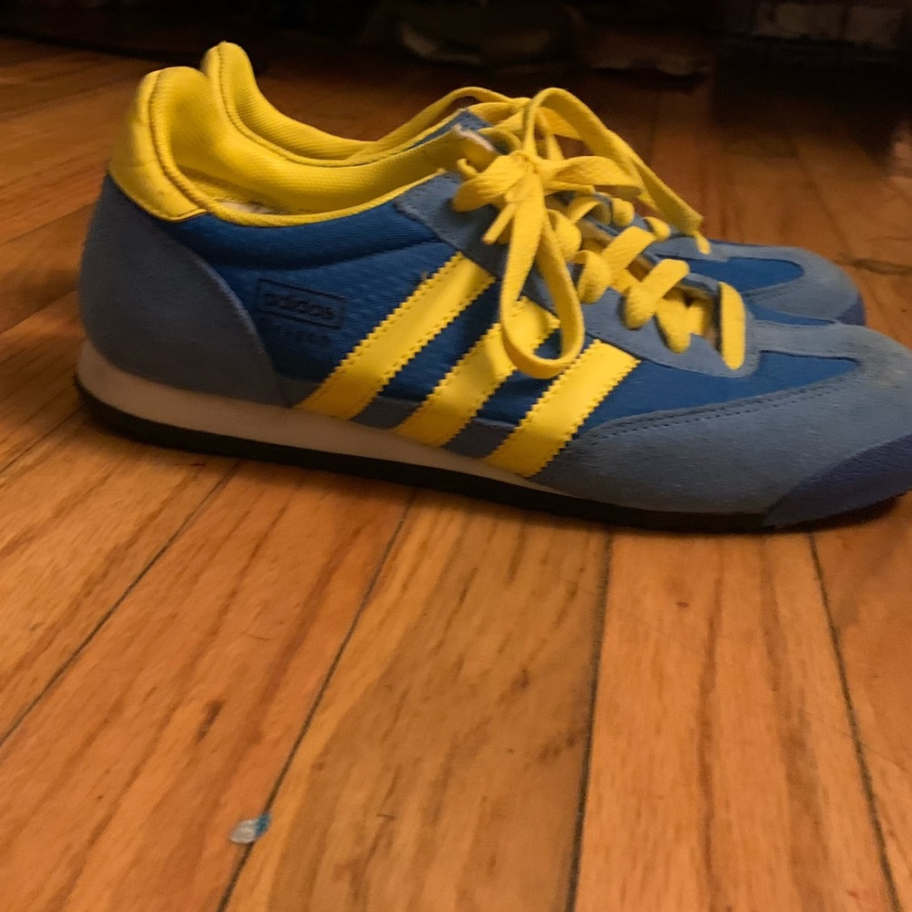 Almost brand new adidas shoes leather. Blue/yellow mens7 or women 9